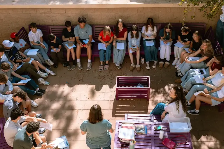 La Casa Youth Studying the Word Outside on Campus